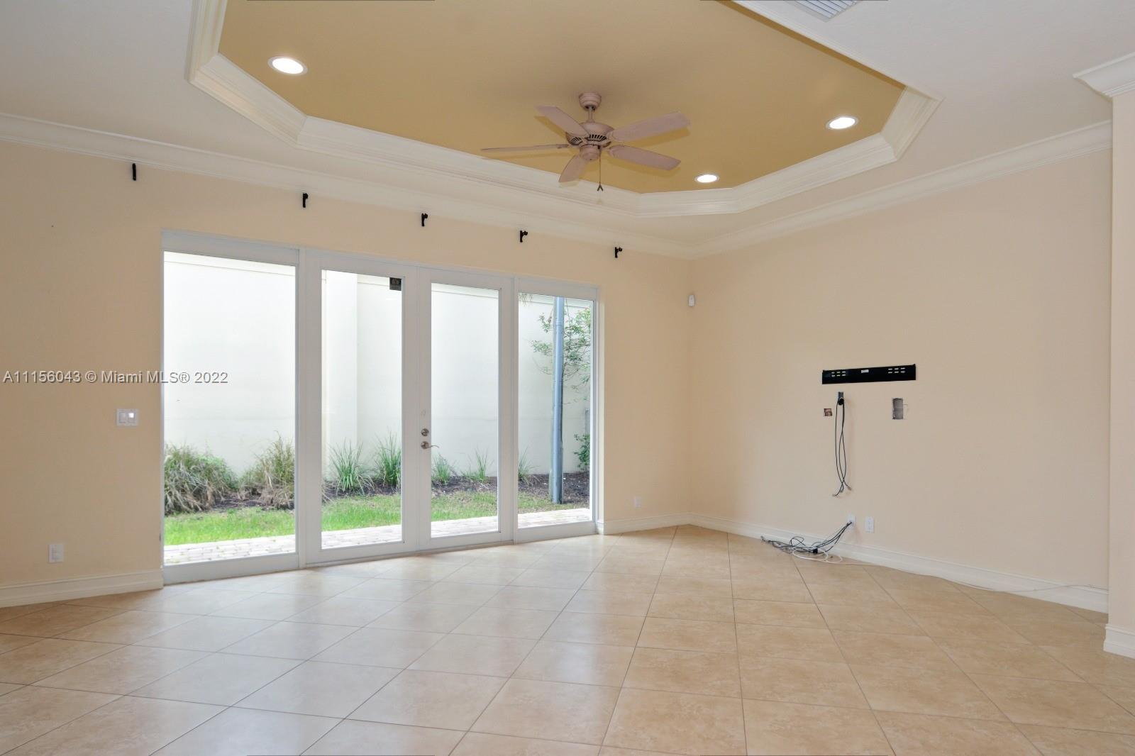 1960 Northeast 33rd Street Lighthouse Point, FL 33064 - Photo 4 of 24 a view of an empty room with windows