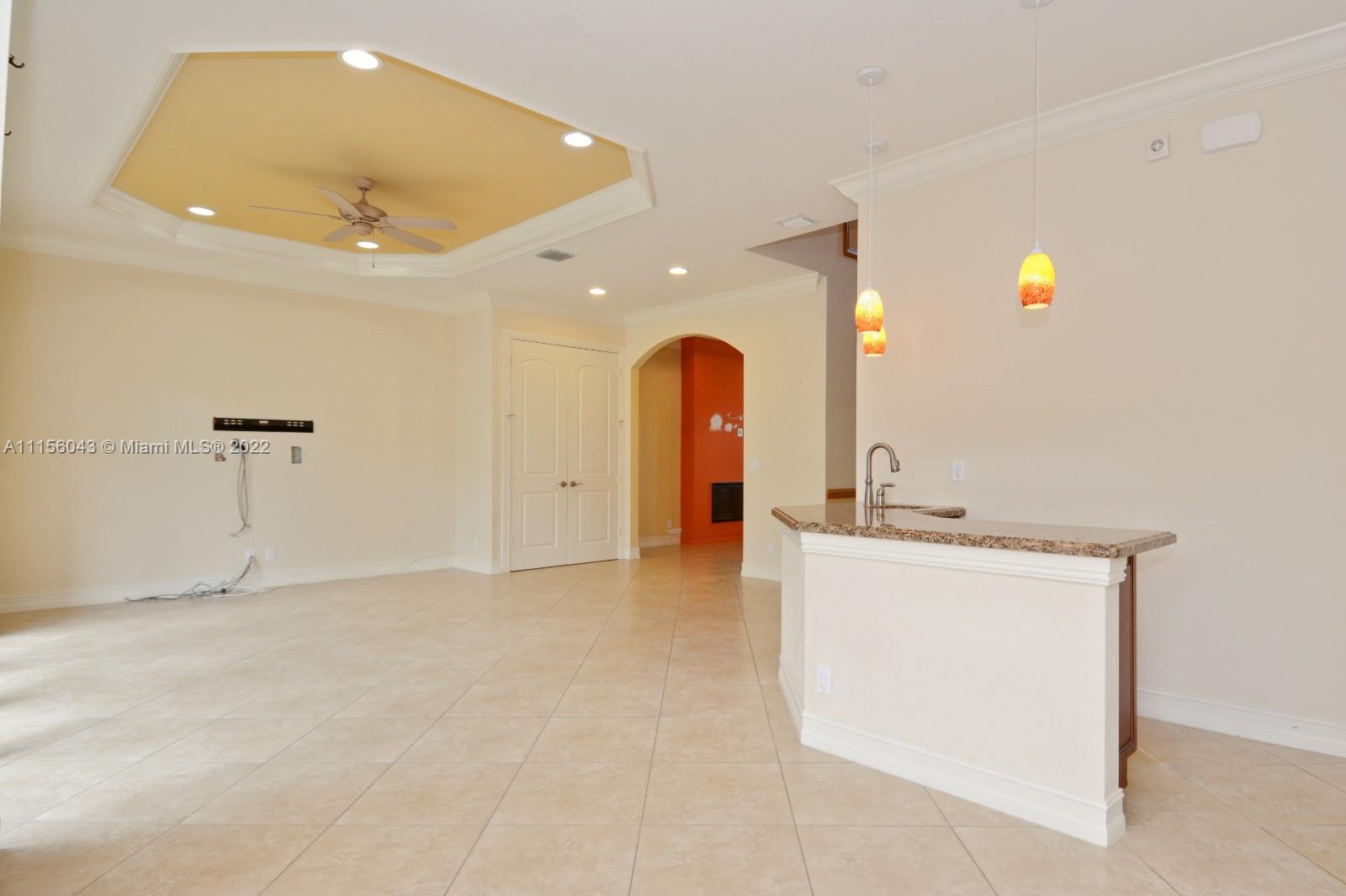 1960 Northeast 33rd Street Lighthouse Point, FL 33064 - Photo 5 of 24 a view of a living room with a sink