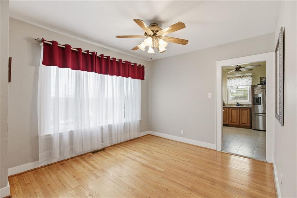 1505 4th Street Monongahela, PA 15063 - Photo 16 of 40 wooden floor in an empty room with a window