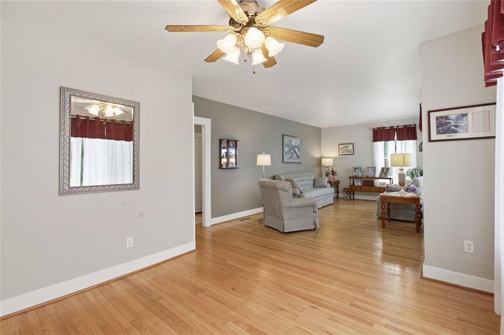 1505 4th Street Monongahela, PA 15063 - Photo 17 of 40 a living room with couches chairs and closet with wooden floor