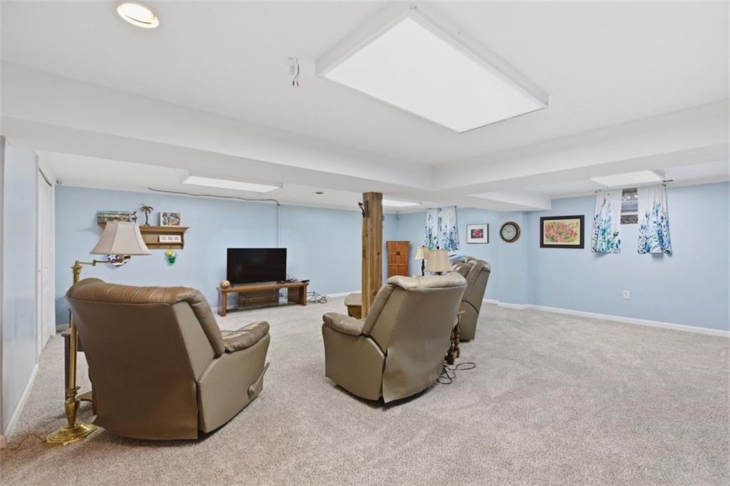 1505 4th Street Monongahela, PA 15063 - Photo 24 of 40 a living room with furniture and a flat screen tv