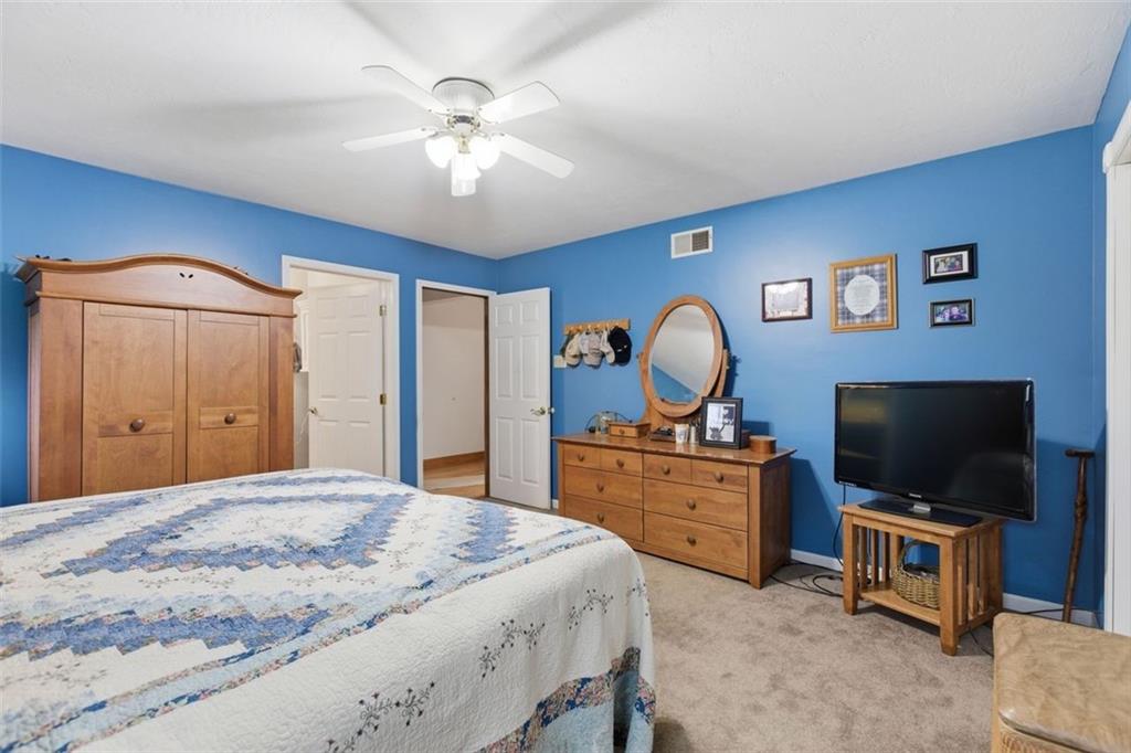 1505 4th Street Monongahela, PA 15063 - Photo 28 of 40 a bedroom with a bed and a flat screen tv