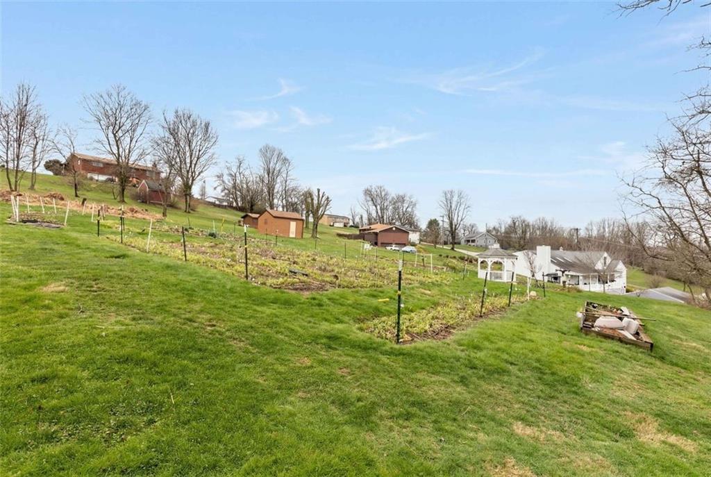 1505 4th Street Monongahela, PA 15063 - Photo 9 of 40 a view of a golf course with a lake
