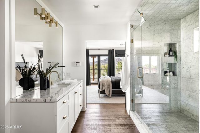 a bathroom with sink and mirror