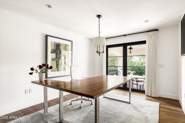 a view of a livingroom with furniture and window
