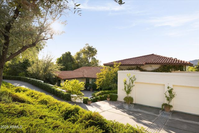 a view of swimming pool with a patio