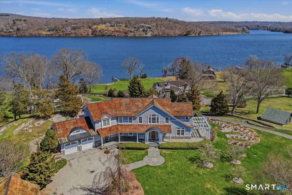 175 River Road Essex, CT 06426 - Photo 38 of 40 an aerial view of a house with a garden and lake view
