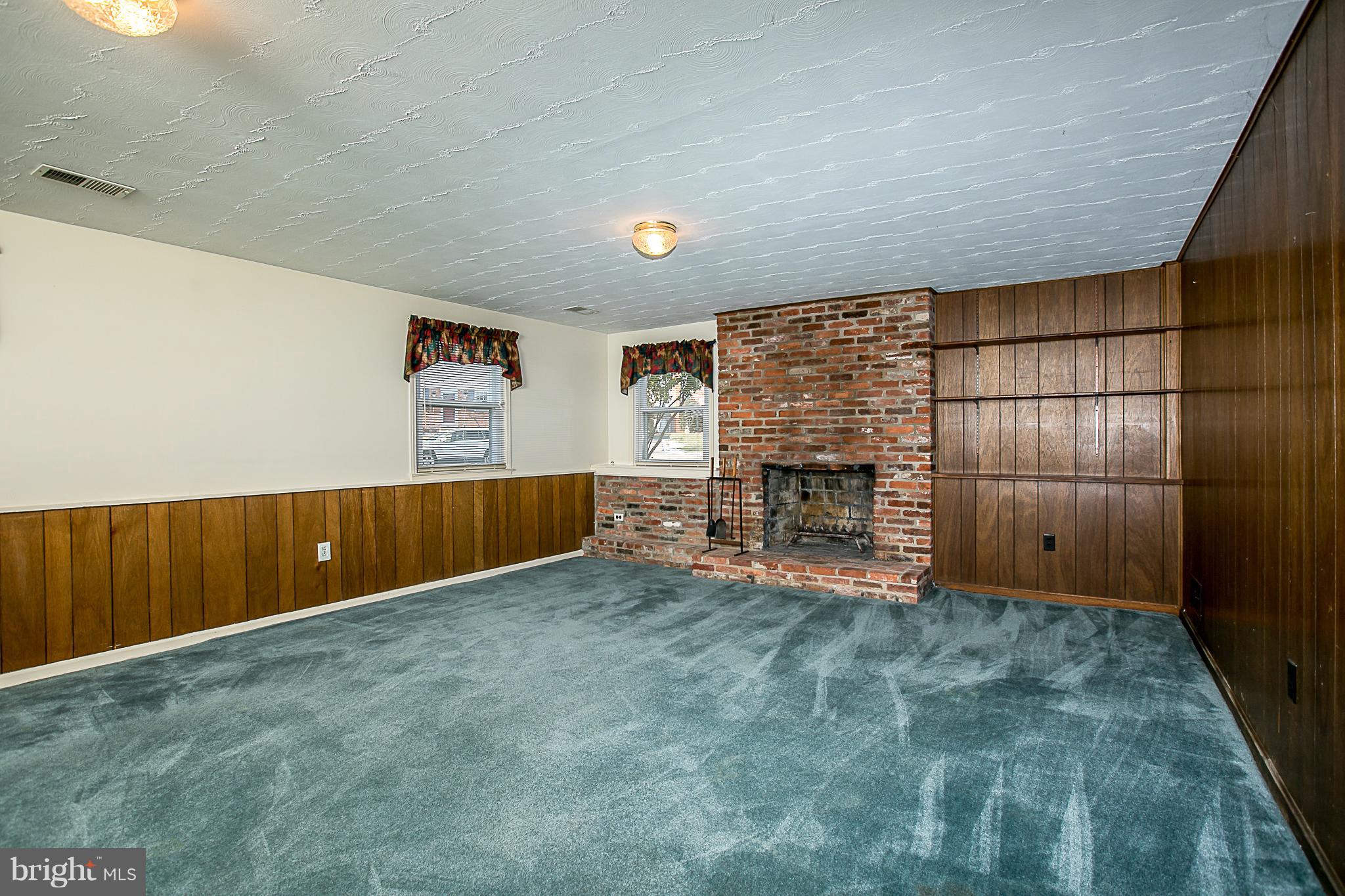 6210 Roblynn Road Laurel, MD 20707 - Photo 21 of 29 Family Room with Masonry Fireplace