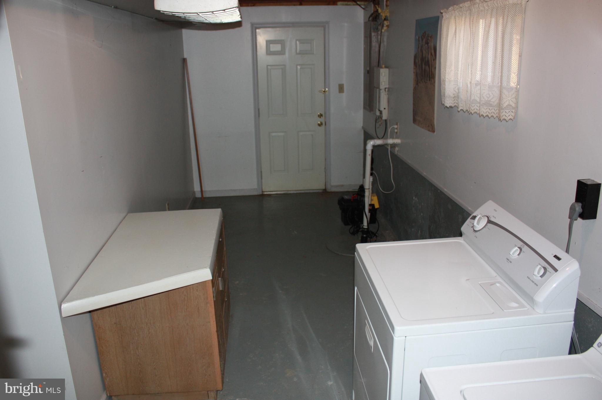 6210 Roblynn Road Laurel, MD 20707 - Photo 29 of 29 Spacious Laundry Room with outside exit