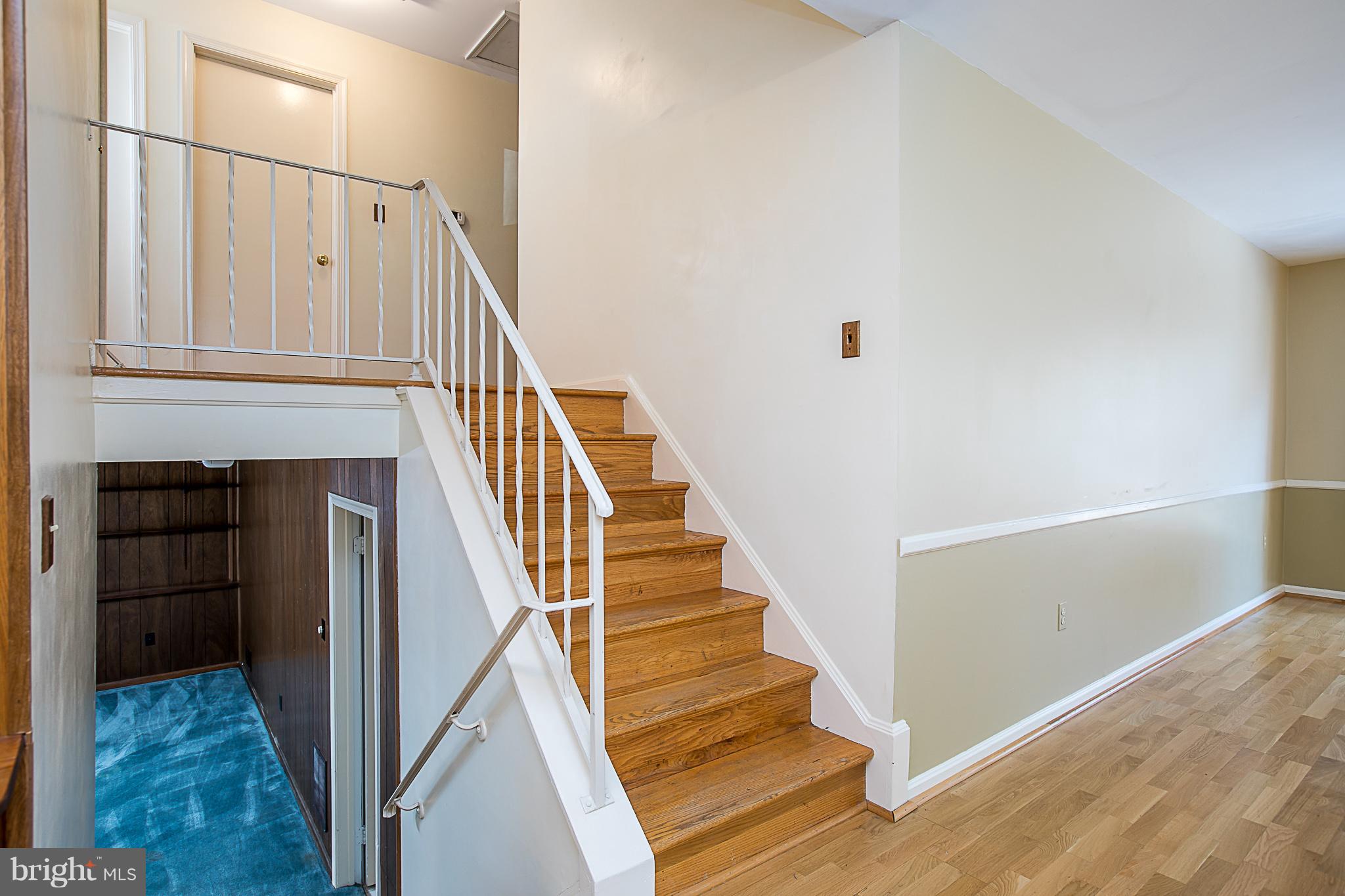 6210 Roblynn Road Laurel, MD 20707 - Photo 10 of 29 Hardwood Stairs/Hallway