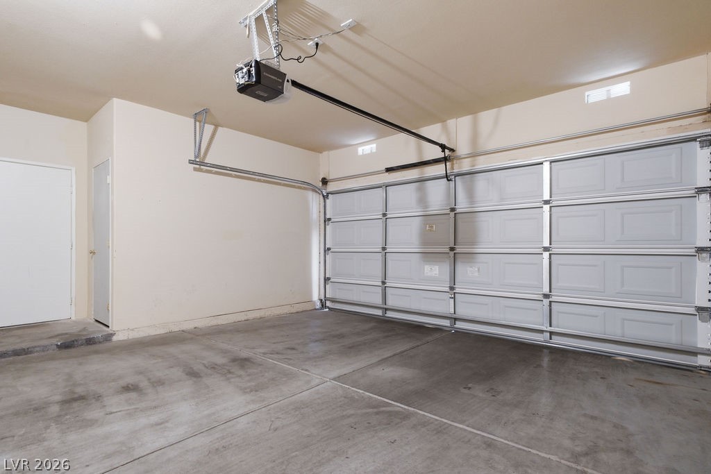 10550 West Alexander Road, Unit 2133 Las Vegas, NV 89129 - Photo 7 of 42 Rare private 2-car garage with direct internal access to the unit.
