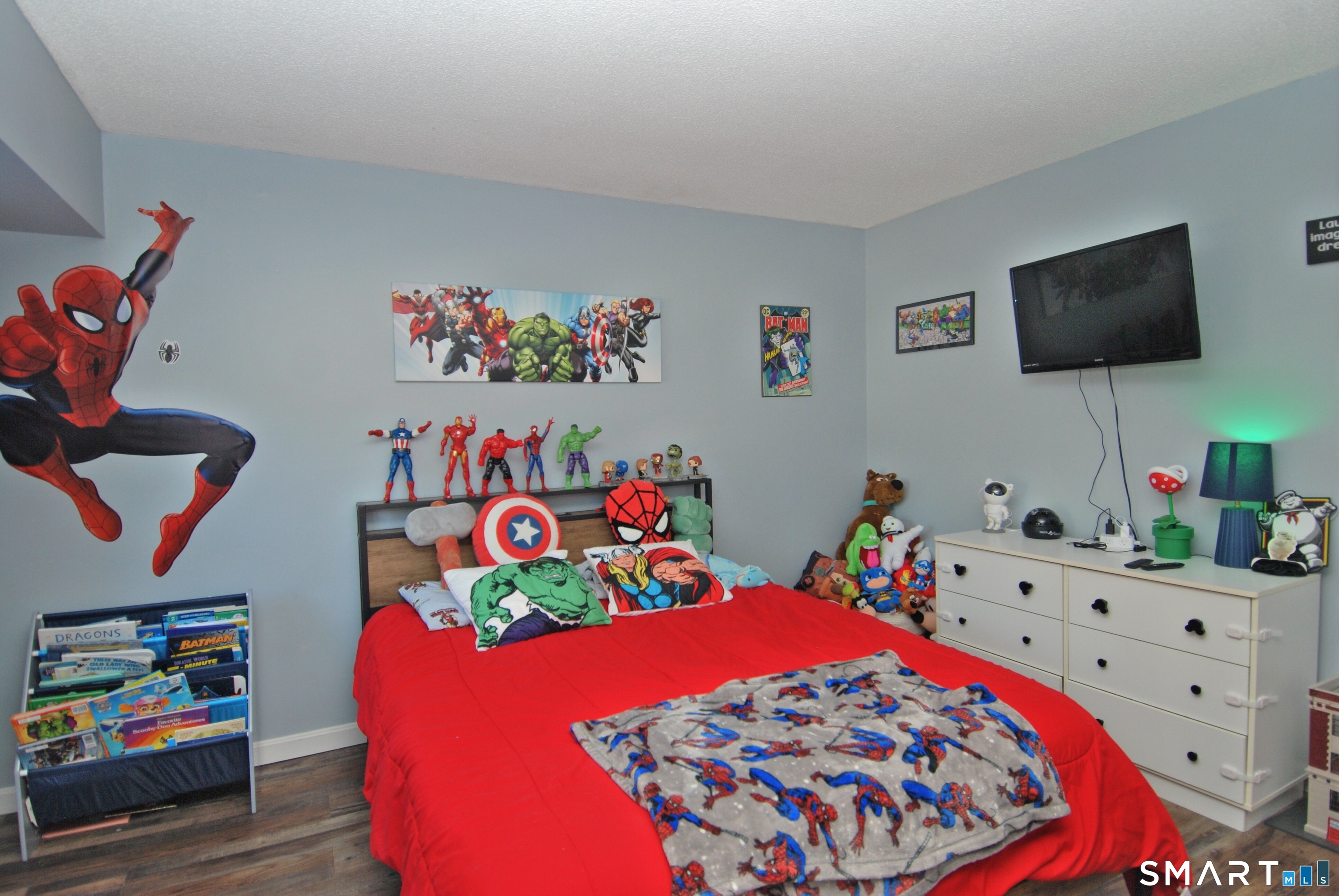 321 Greens Loop, Unit 321 Cheshire, CT 06410 - Photo 15 of 24 a bedroom with furniture and a flat screen tv