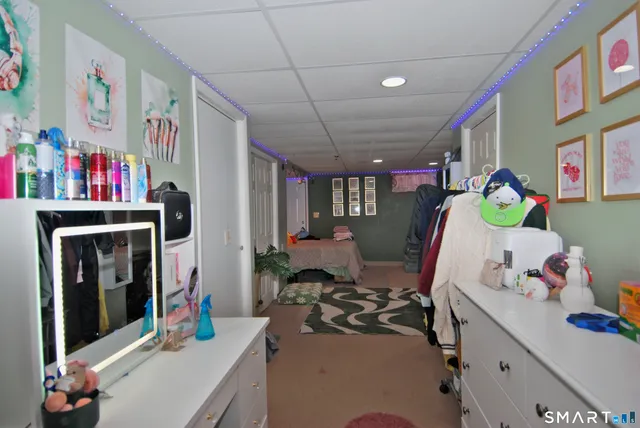 a bed room with a bed and a desk