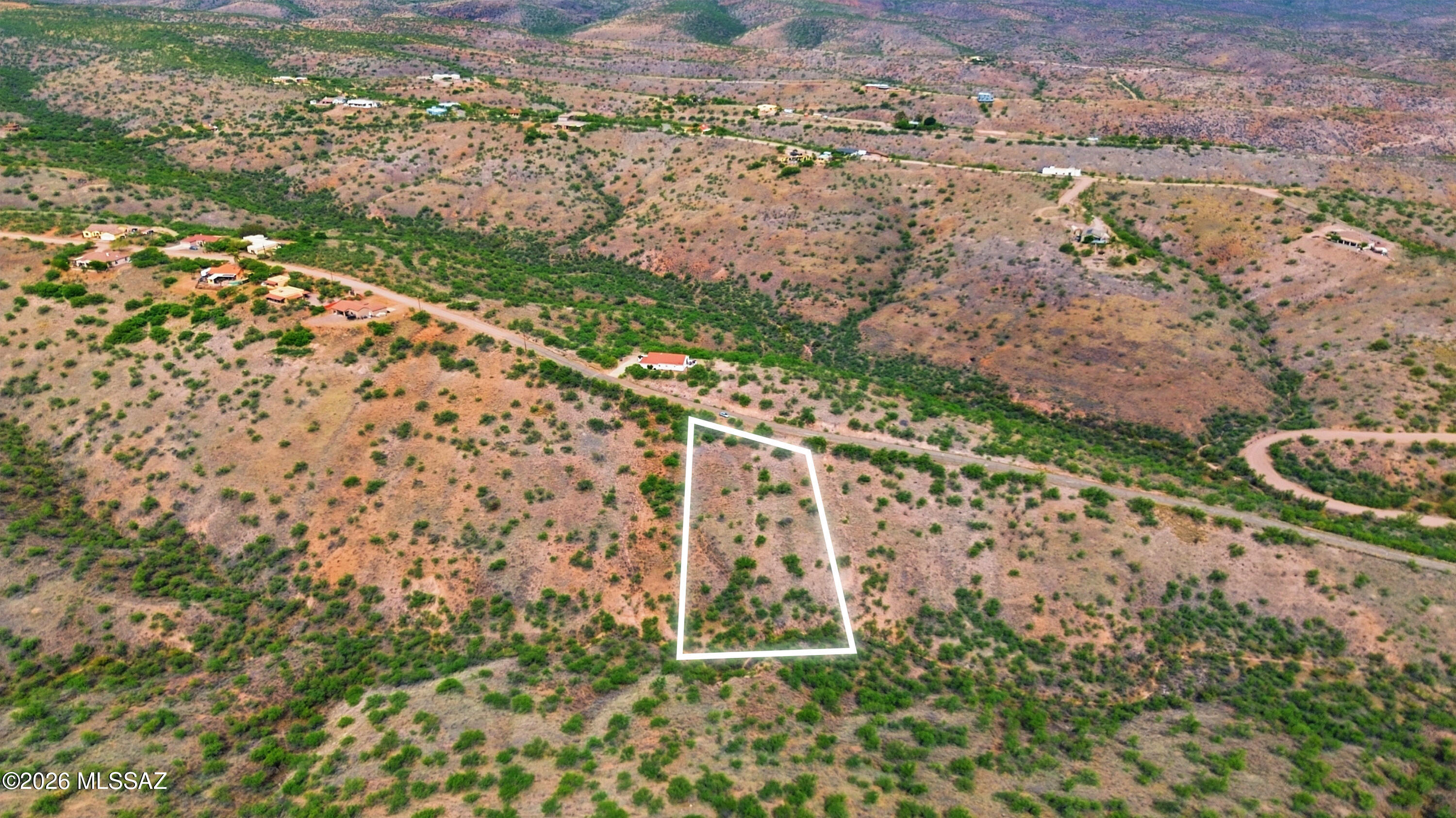 1544 Circulo Jacona, Unit 119 Rio Rico, AZ 85648 - Photo 11 of 16 a view of a garden with an outdoor space