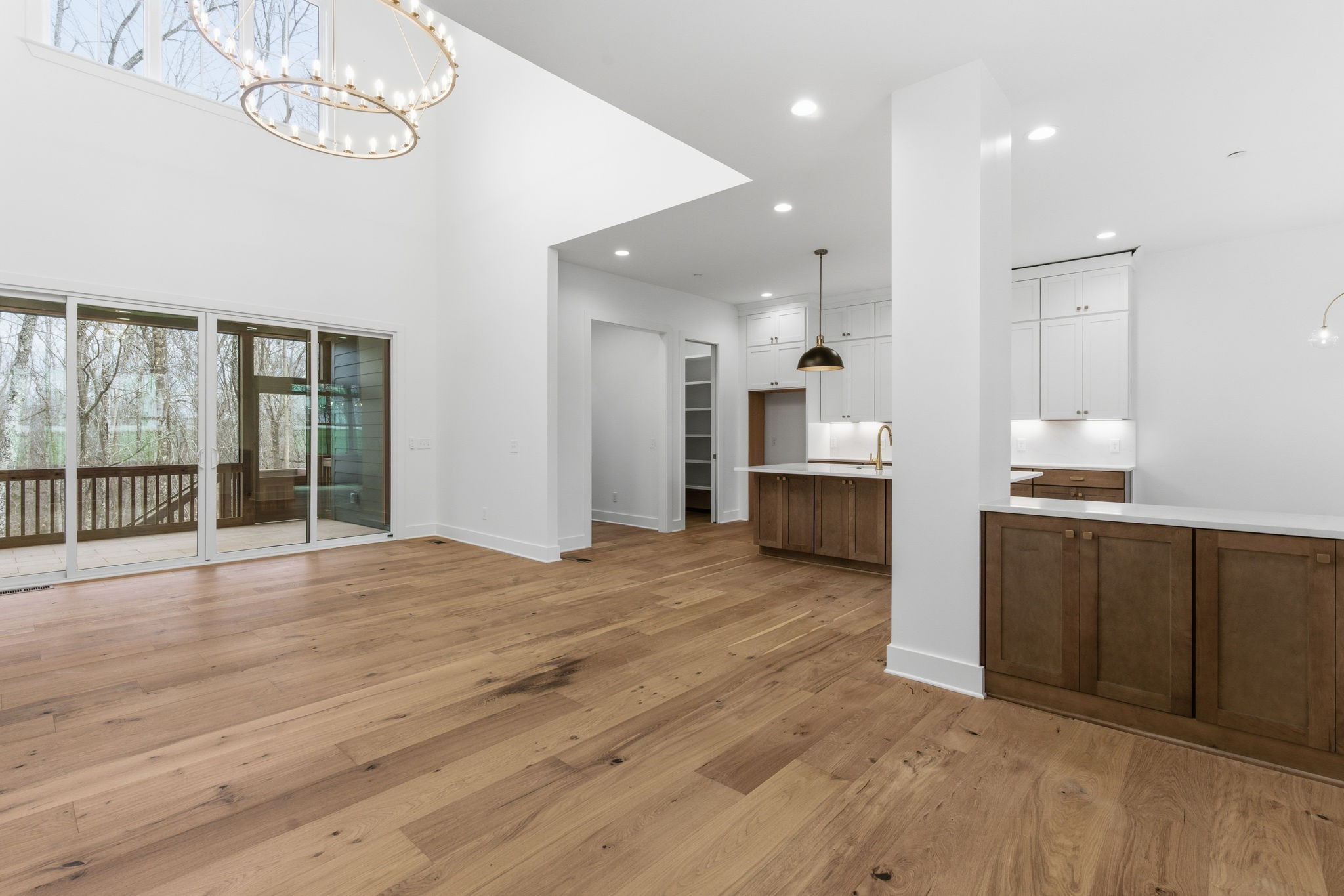 478 Mt Pleasant Road Kingston Springs, TN 37082 - Photo 12 of 59 a view of a kitchen with wooden floor and a sink