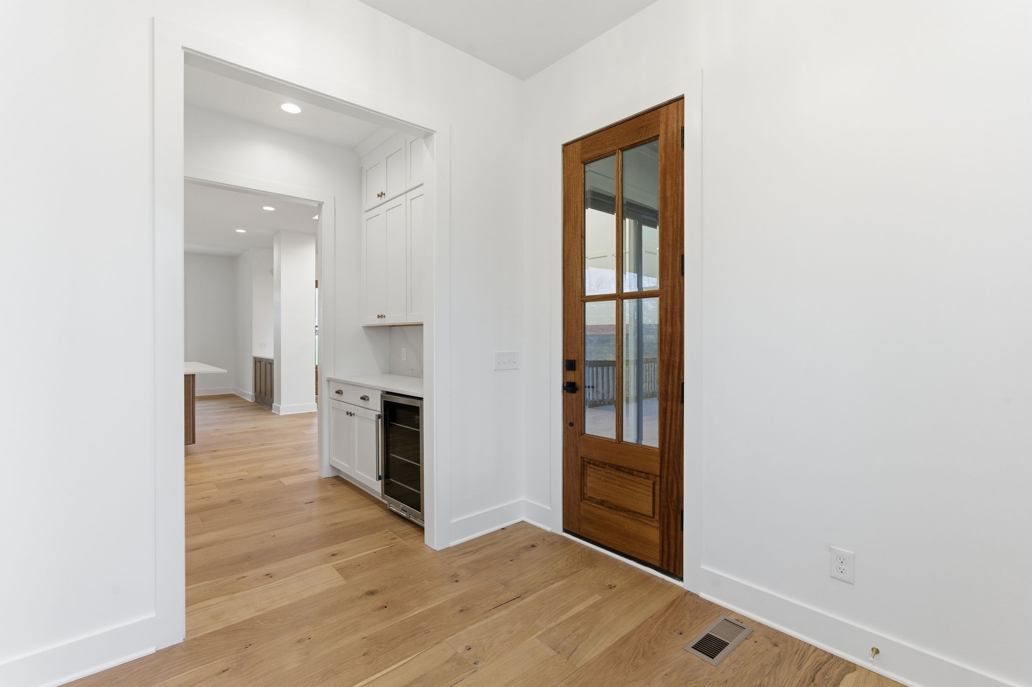 478 Mt Pleasant Road Kingston Springs, TN 37082 - Photo 19 of 59 an empty room with wooden floor and windows