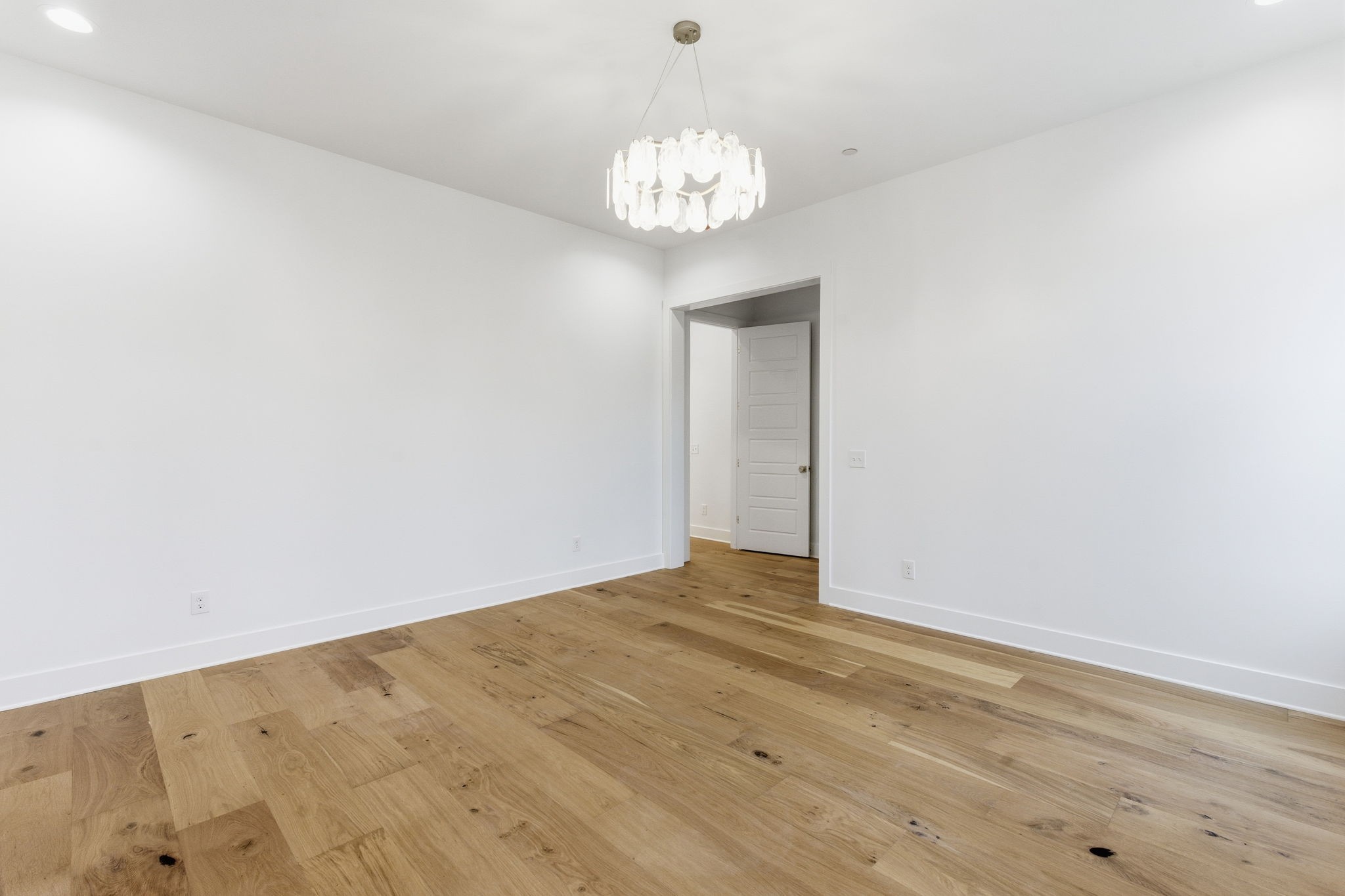 478 Mt Pleasant Road Kingston Springs, TN 37082 - Photo 22 of 59 a view of an empty room with wooden floor