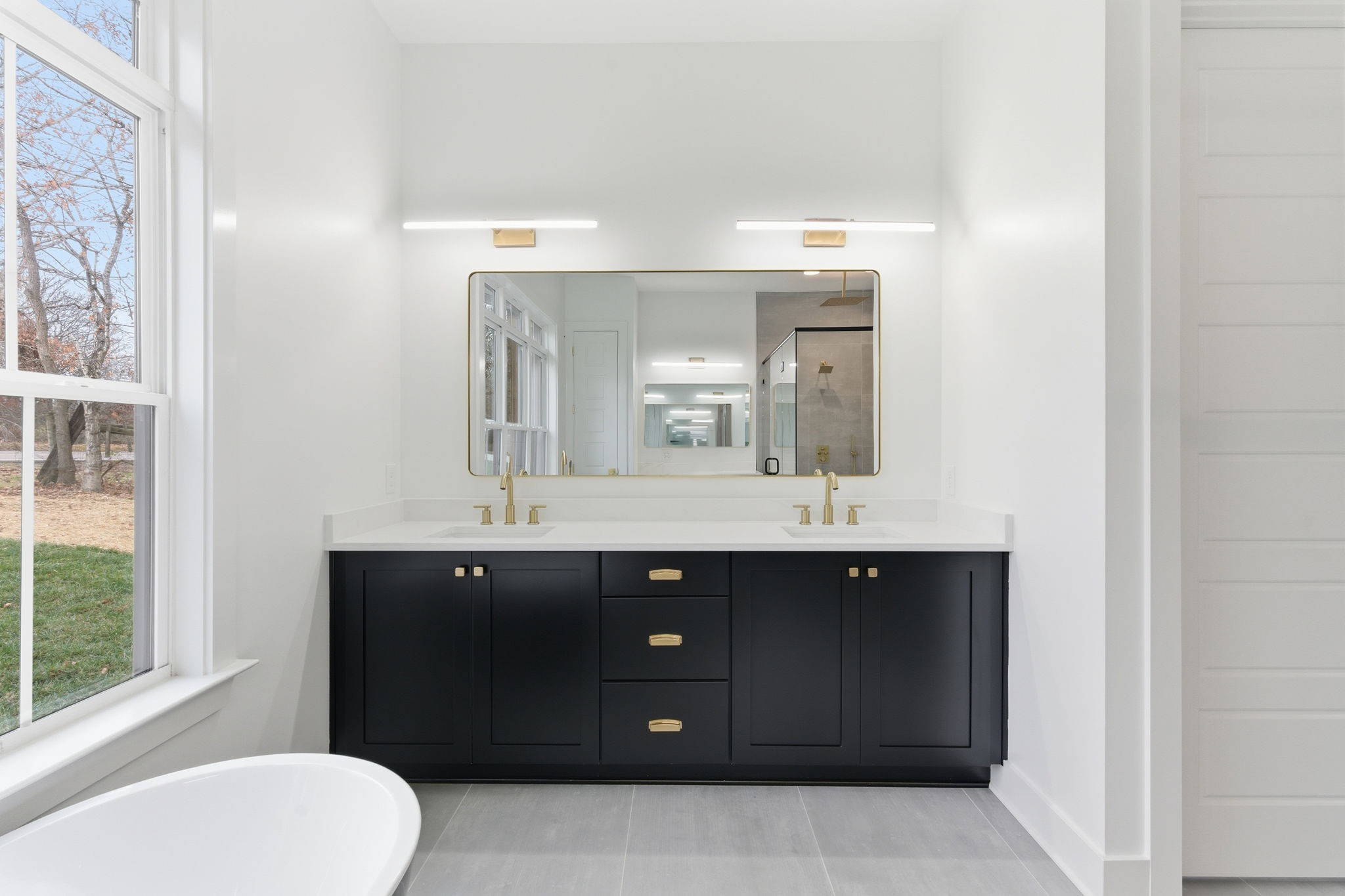 478 Mt Pleasant Road Kingston Springs, TN 37082 - Photo 29 of 59 a bathroom with a double vanity sink and mirror