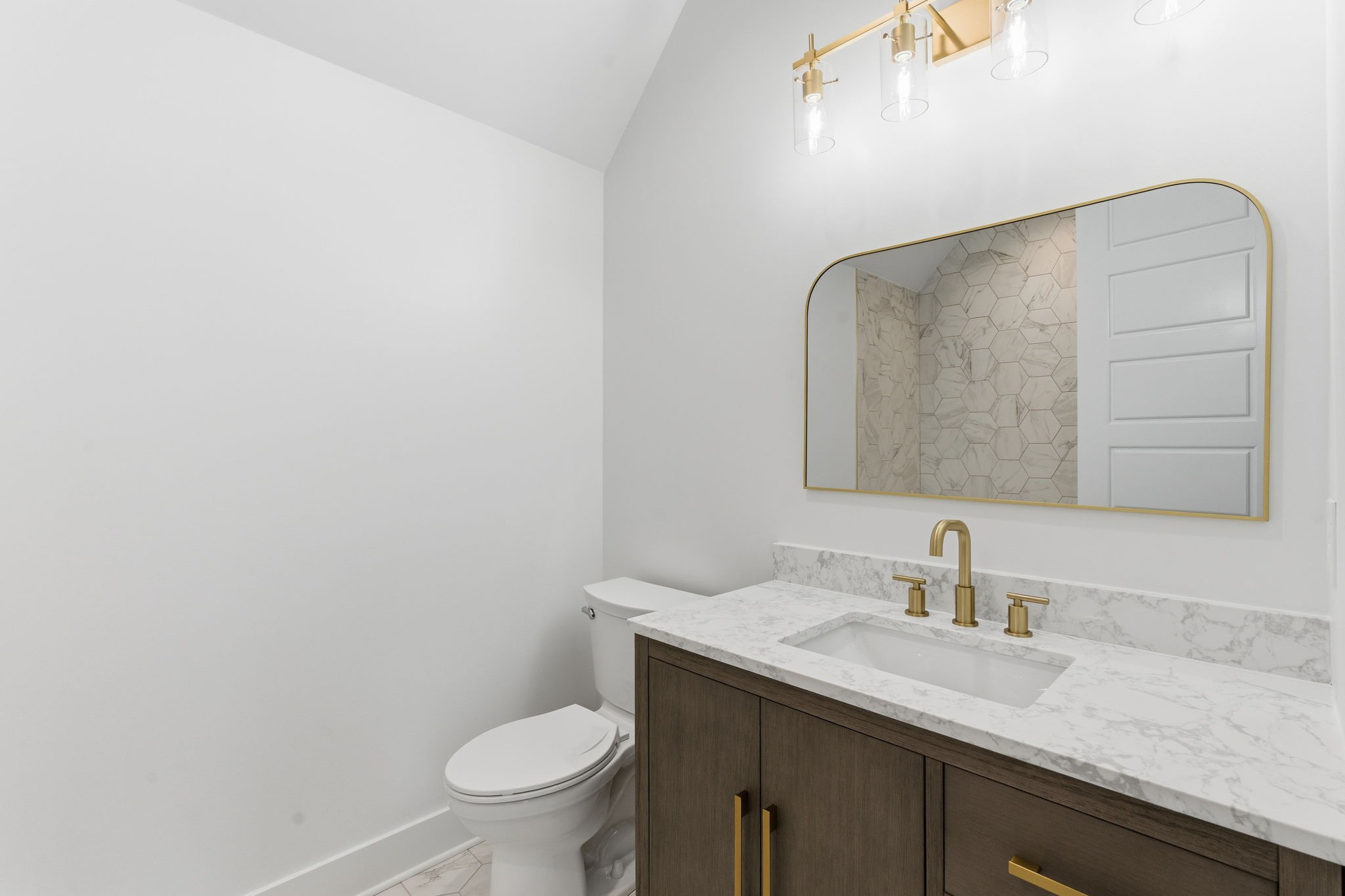 478 Mt Pleasant Road Kingston Springs, TN 37082 - Photo 37 of 59 a bathroom with a granite countertop sink a toilet and a mirror