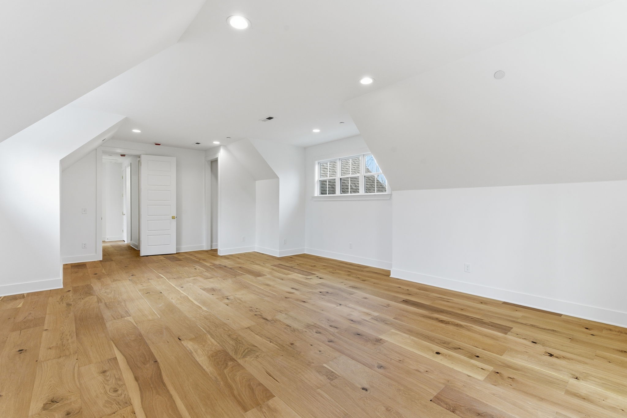 478 Mt Pleasant Road Kingston Springs, TN 37082 - Photo 40 of 59 a view of an empty room and wooden floor