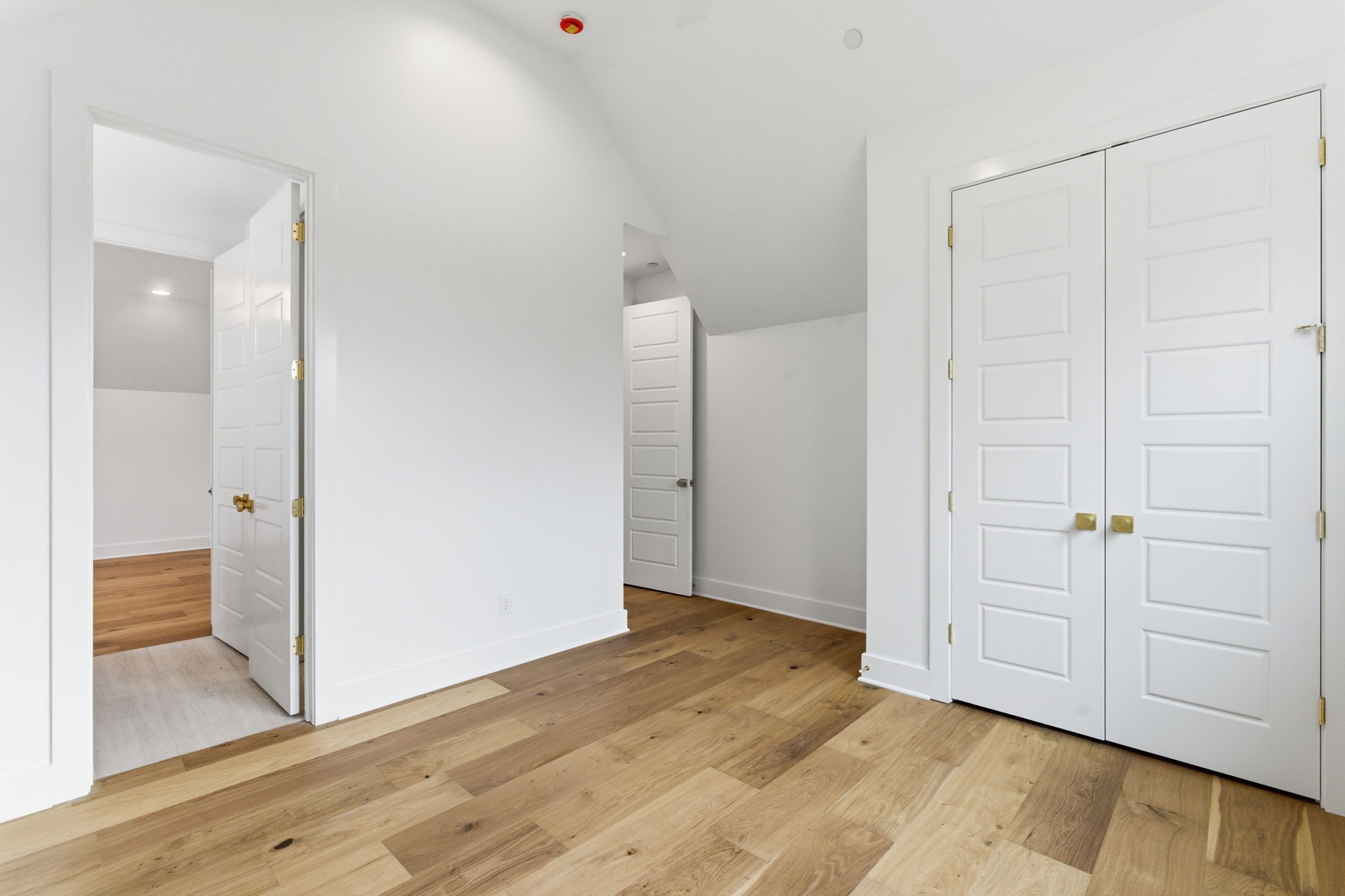 478 Mt Pleasant Road Kingston Springs, TN 37082 - Photo 45 of 59 an empty room with wooden floor and sliding door