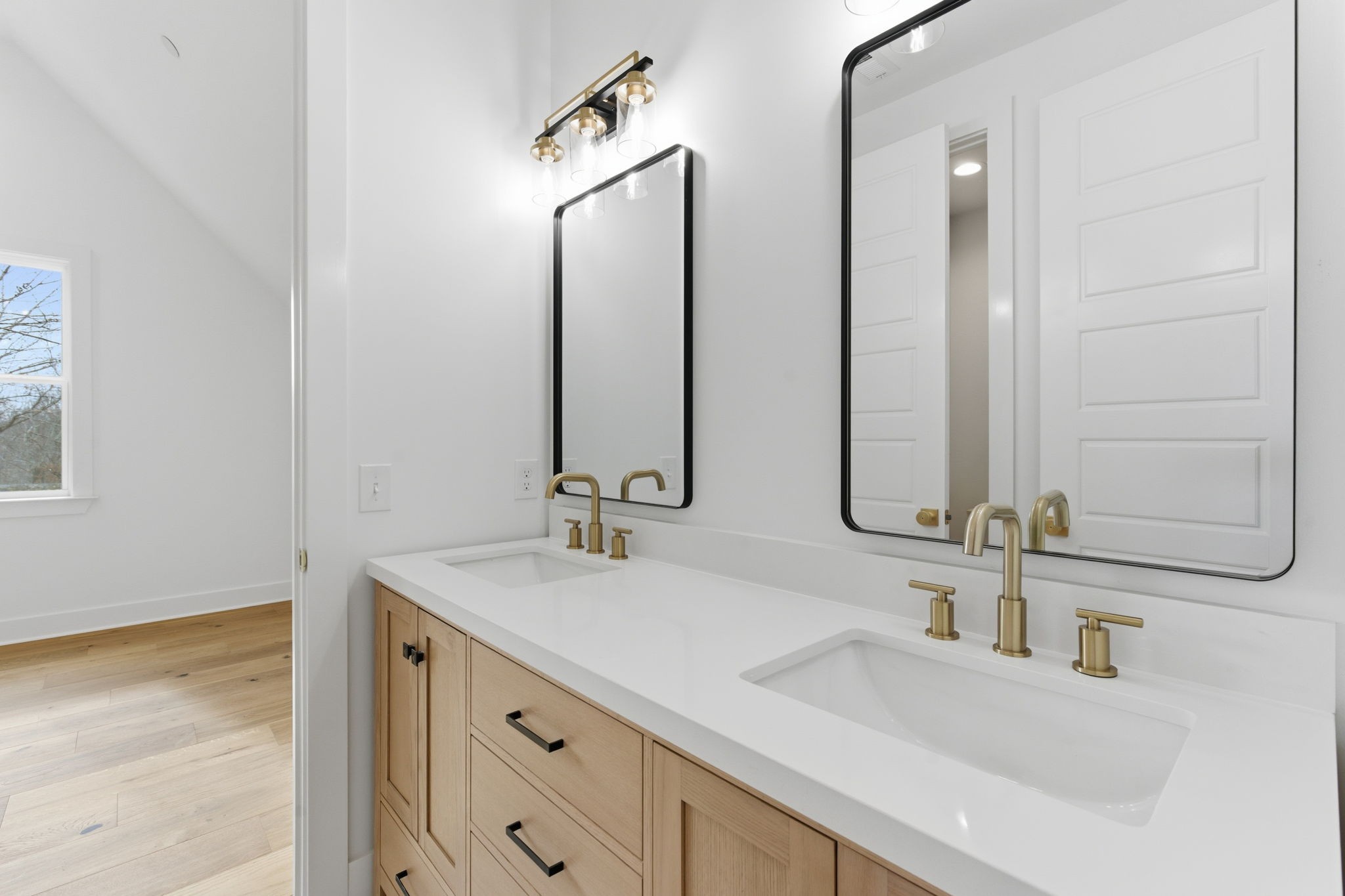 478 Mt Pleasant Road Kingston Springs, TN 37082 - Photo 46 of 59 a bathroom with a double vanity sink and a mirror