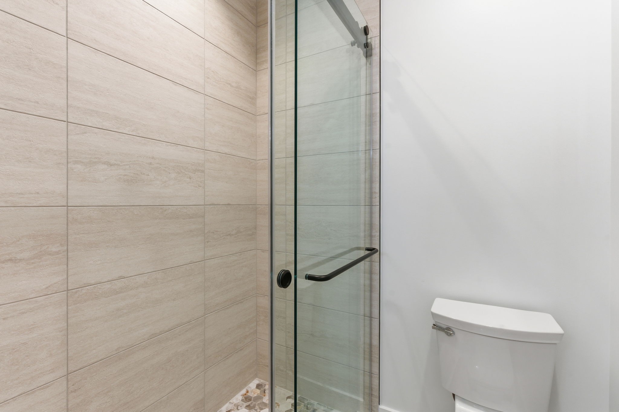 478 Mt Pleasant Road Kingston Springs, TN 37082 - Photo 47 of 59 a bathroom with a shower and toilet