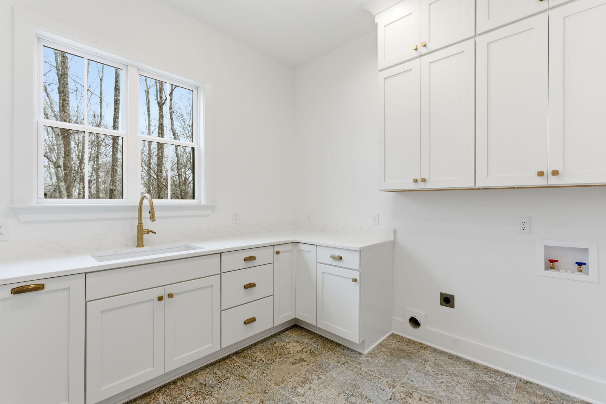478 Mt Pleasant Road Kingston Springs, TN 37082 - Photo 49 of 59 a room with white cabinets and window