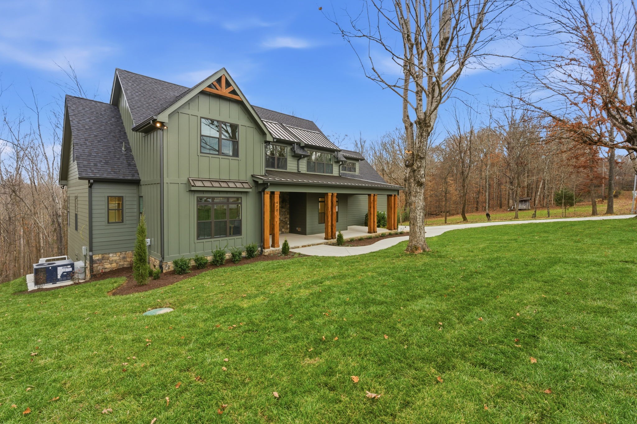 478 Mt Pleasant Road Kingston Springs, TN 37082 - Photo 5 of 59 a front view of a house with garden