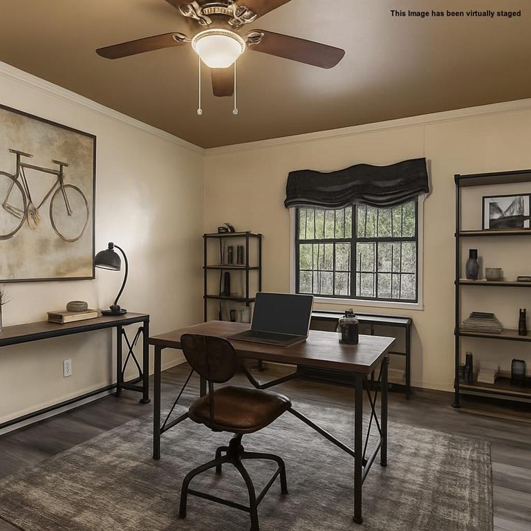 2622 Centerville Road Dallas, TX 75228 - Photo 11 of 22 a workspace with furniture a rug and a window