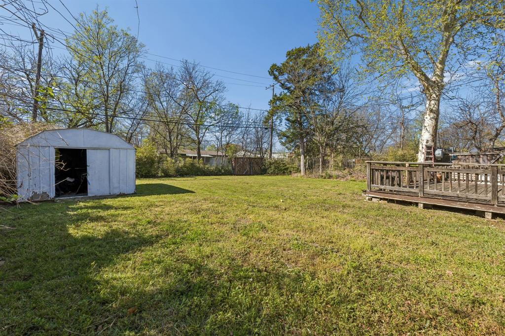 2622 Centerville Road Dallas, TX 75228 - Photo 21 of 22 a view of a garden with large trees