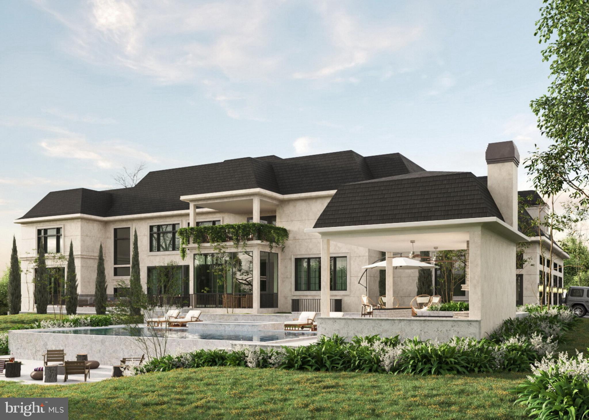 7716 Georgetown Pike McLean, VA 22102 - Photo 22 of 22 a front view of a house with a yard table and chairs