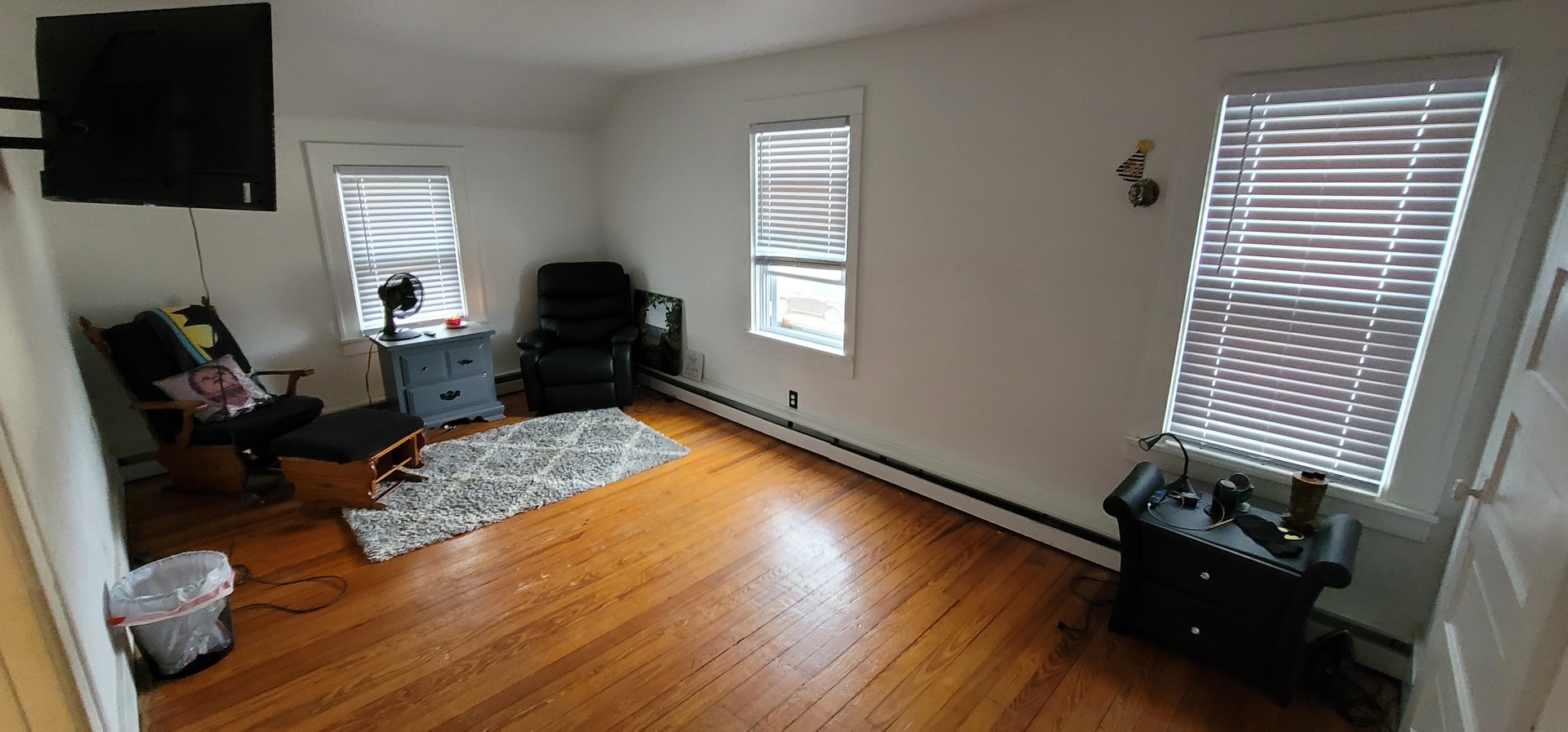 709 Ave C Sterling, IL 61081 - Photo 11 of 16 a living room with furniture and a flat screen tv