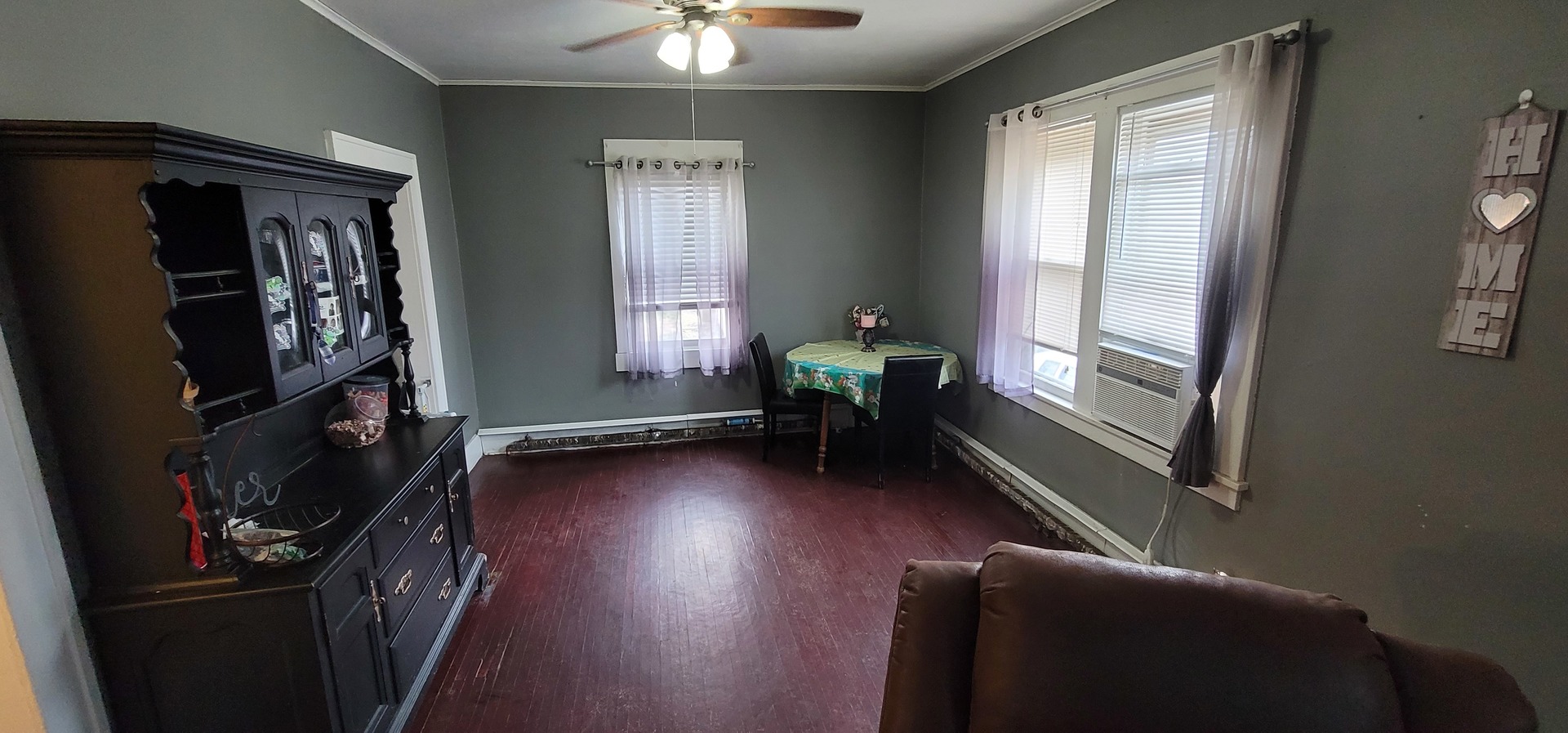 709 Ave C Sterling, IL 61081 - Photo 6 of 16 a living room with furniture and a flat screen tv