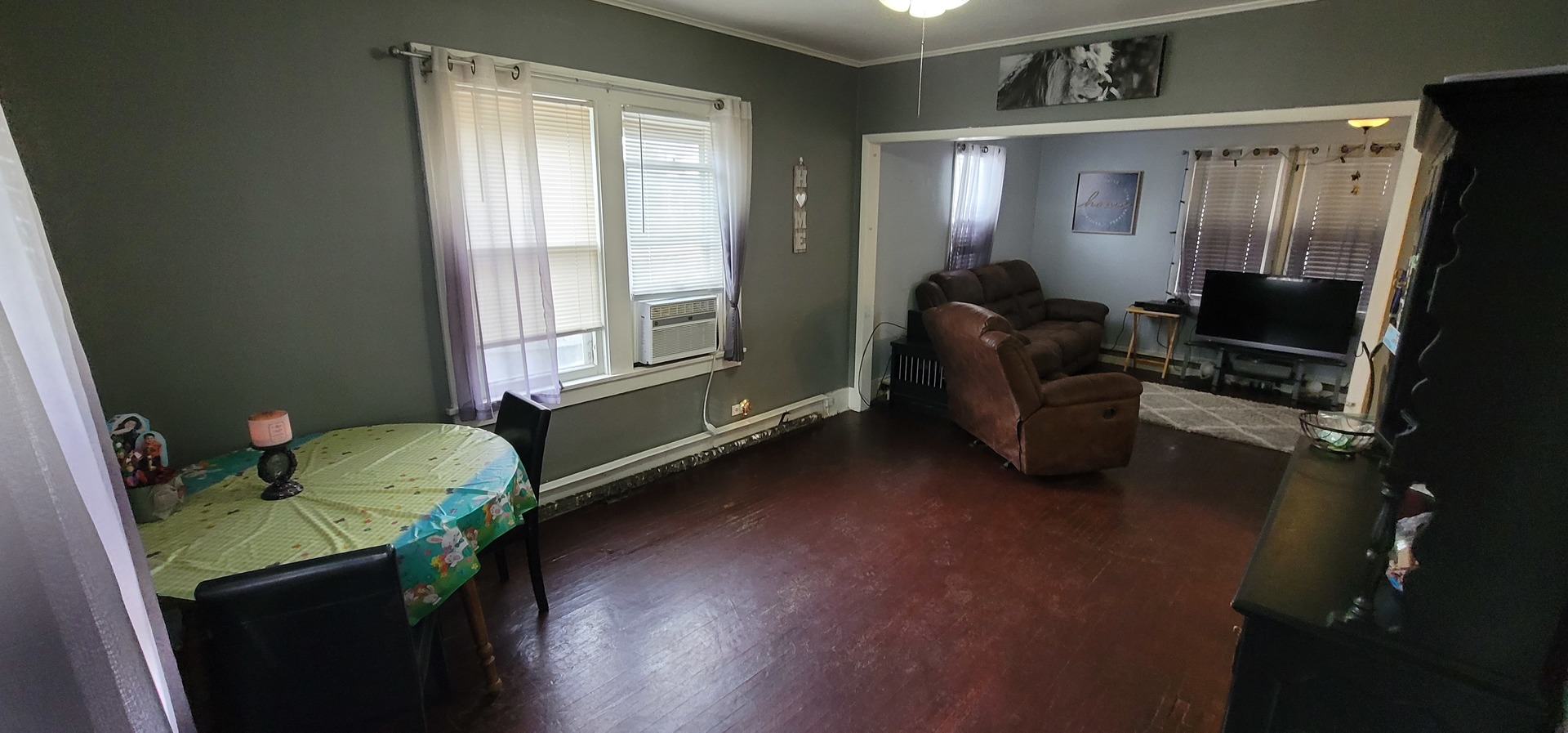 709 Ave C Sterling, IL 61081 - Photo 7 of 16 a workspace with furniture and a window