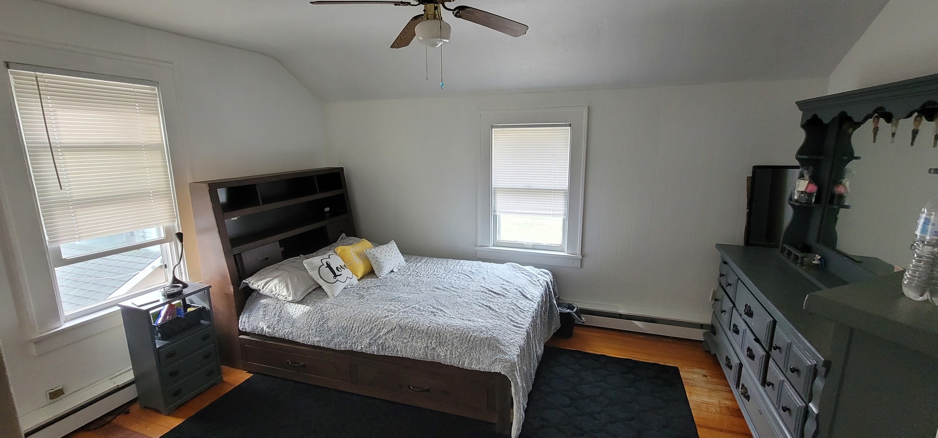 709 Ave C Sterling, IL 61081 - Photo 9 of 16 a bedroom with a bed and a window
