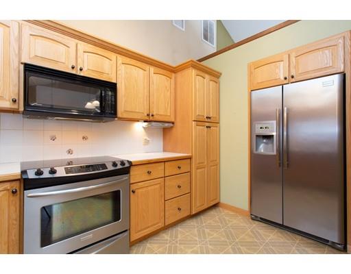250 Sawmill Road West Springfield, MA 01089 - Photo 9 of 26 a kitchen with stainless steel appliances granite countertop a stove microwave and refrigerator