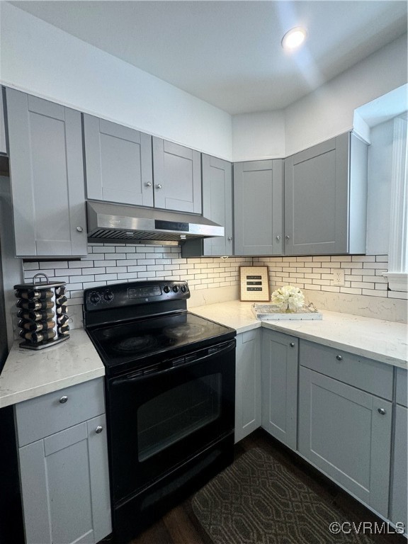 7300 Vernon Road Henrico, VA 23228 - Photo 11 of 20 Kitchen featuring range, decorative backsplash, ex