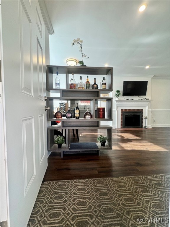 7300 Vernon Road Henrico, VA 23228 - Photo 2 of 20 Bar with ornamental molding, dark wood-type floori
