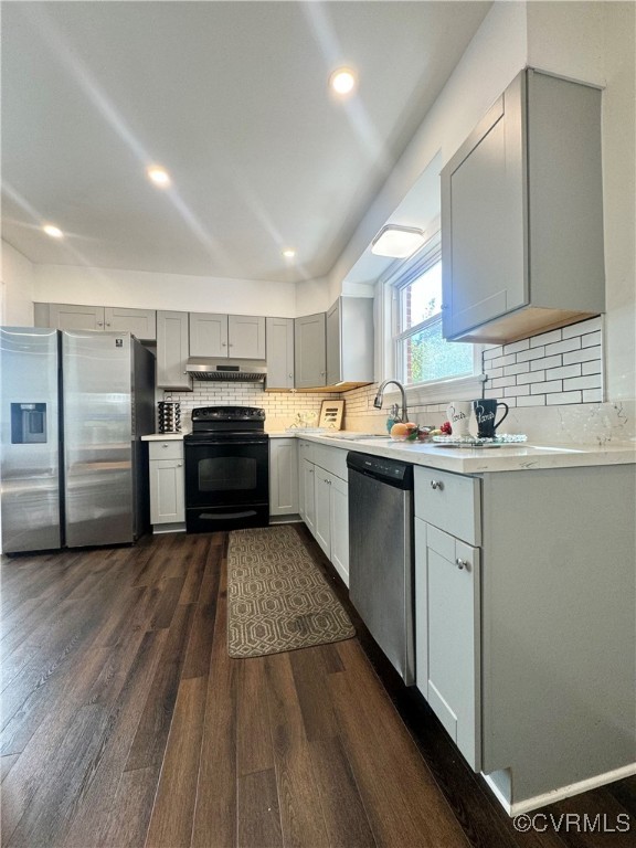 7300 Vernon Road Henrico, VA 23228 - Photo 10 of 20 Kitchen featuring backsplash, dark wood-type floor