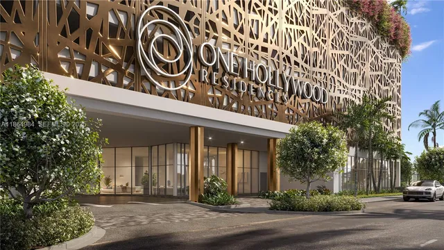 a living room with furniture potted plant and a large window