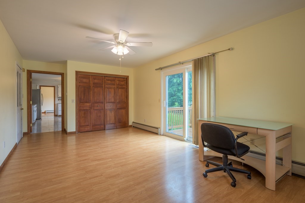 2 Wintergreen Circle Amherst, MA 01002 - Photo 13 of 37 a view of a livingroom with workspace and a window