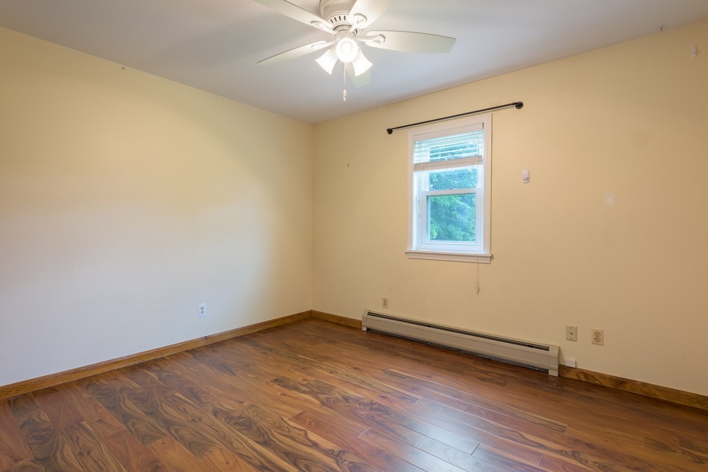 2 Wintergreen Circle Amherst, MA 01002 - Photo 15 of 37 a view of a room with wooden floor and natural light