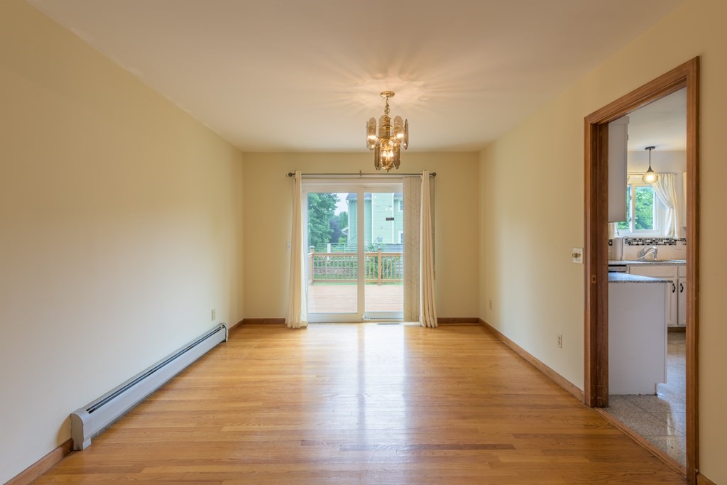 2 Wintergreen Circle Amherst, MA 01002 - Photo 10 of 37 a view of an empty room with glass door