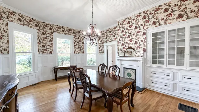 a kitchen with granite countertop a stove and a microwave