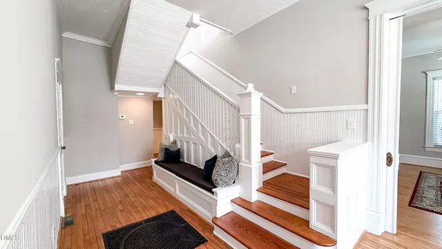 a living room with furniture fireplace and flat screen tv