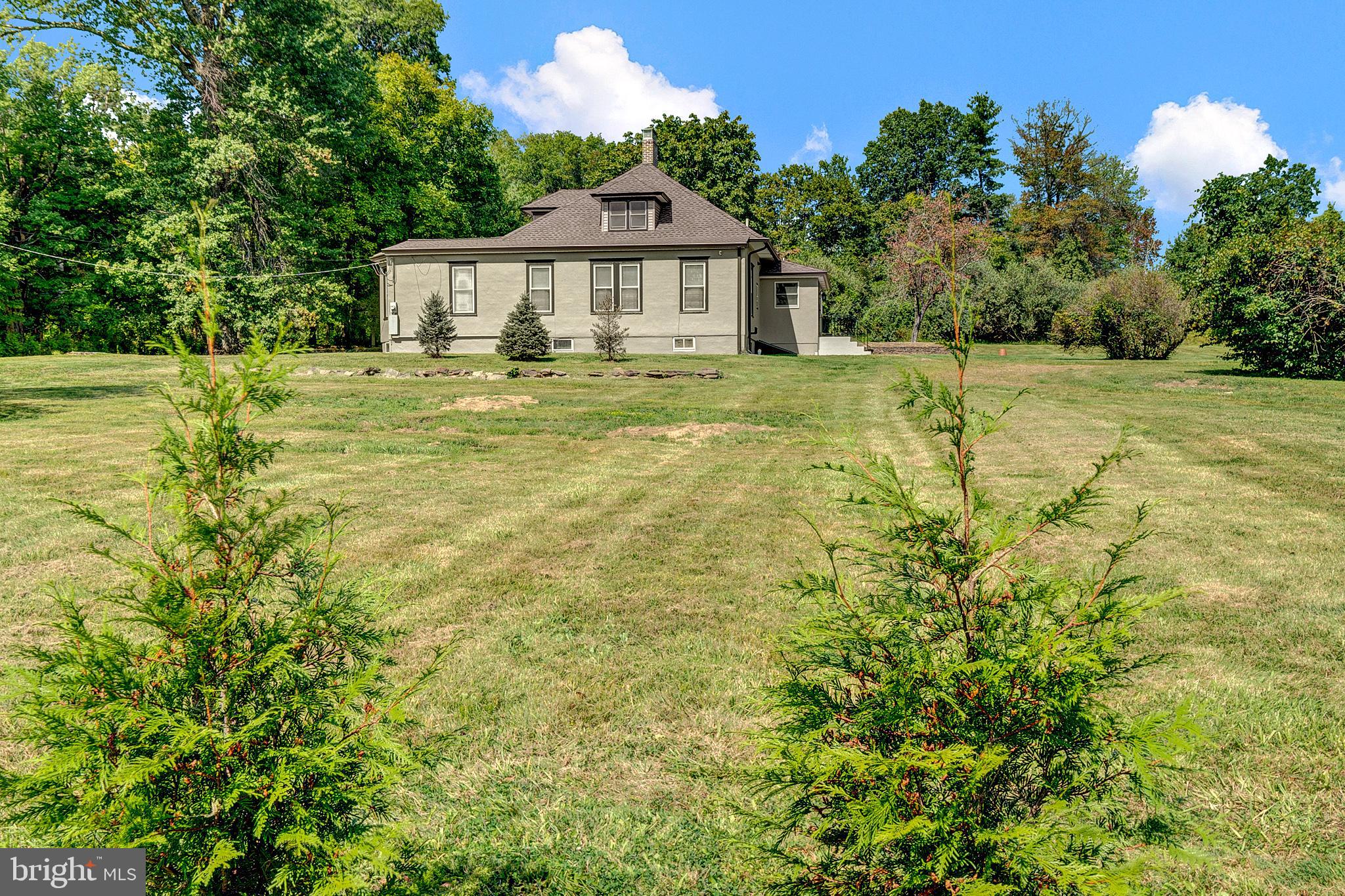 145 Hopewell - Wertsville Road Hopewell, NJ 08525 - Photo 2 of 39 a front view of a house with a yard
