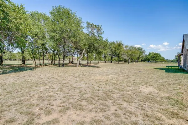 a view of road with trees