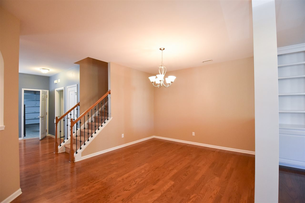 2712 Cloud Mist Circle Raleigh, NC 27614 - Photo 5 of 30 Spacious formal Dining Room w/brushed nickel light fixture and lighted display niche is open to the Living Room over a half-wall. Dining Room