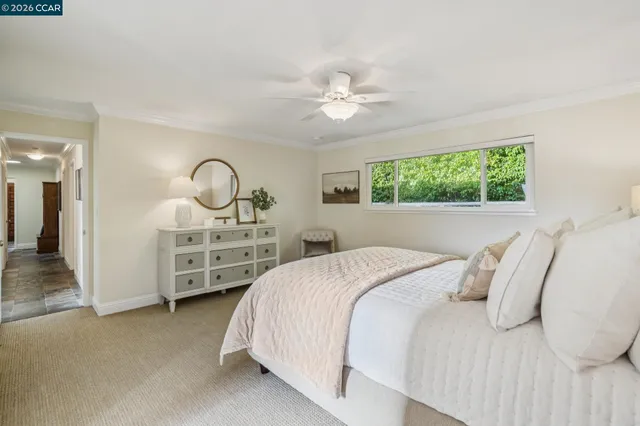 a bedroom with a bed and a closet